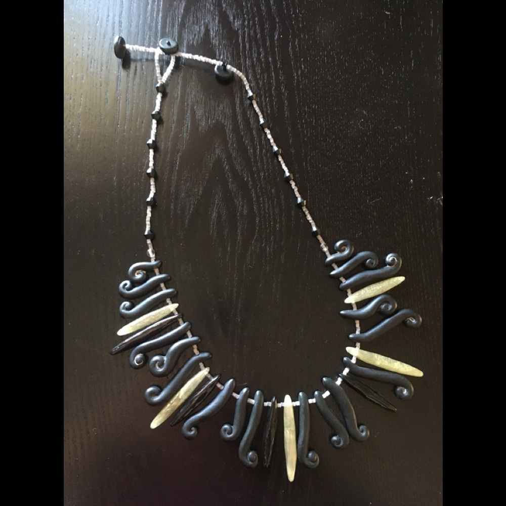 Beaded ladies necklace, brown and clear button closure
